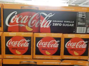 lot 437 image: 4 - 12 packs Coca-Cola Orange Vanil...