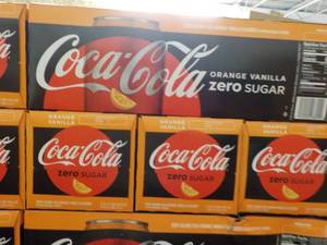 lot 438 image: 4 - 12 packs Coca-Cola Orange Vanil...