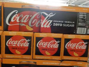 lot 440 image: 4 - 12 packs Coca-Cola Orange Vanil...