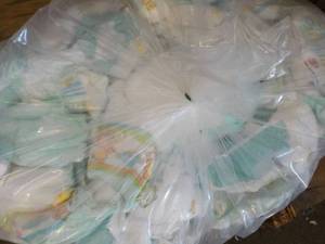 lot 470 image: Bag of 100 or so Diapers Newborn- 3...