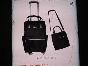 lot 29 image: Mirqablie rolling Shoppe Black Carr...