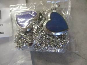 lot 35 image: 4 piece Heart Mood Necklaces...