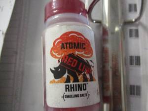 lot 135 image: Atomic Rhino Red Line Smelling Salt...