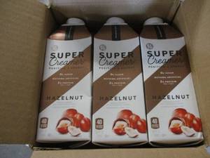 lot 143 image: 3 Bottles of Kitu Hazelnut Super Cr...