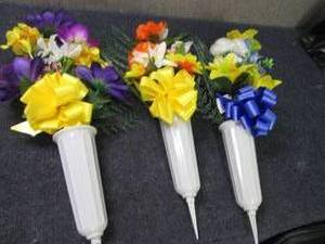 Case of Memorial Flowers in Vases w...