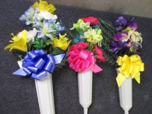 Case of Memorial Flowers in Vases w...