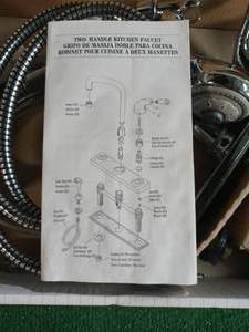 Windemere 2-Handle Standard Kitchen Faucet with Side Sprayer in Stainless by Delta- slightly used- see pictures