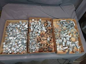 lot 48 image: Conduit Clamps and Electrical Studs