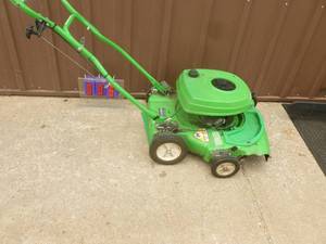 lot 6 image: Lawn Boy push mower. Consignor states it runs. As shown.