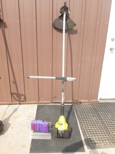 lot 17 image: McCullough weed trimmer. Tested & works. As shown.