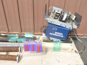 lot 18 image: Misc Garagre door opener parts with track & chains. As shown.