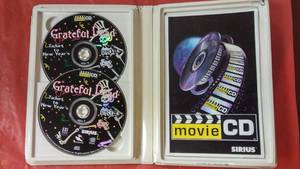 lot 26 image: Greatful Dead Ticket to New Years Movie CD Set