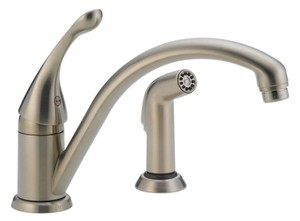 lot 703 image: Delta Collins Single-Handle Standard Kitchen Faucet with Side Sprayer in Stainless Steel