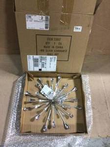 lot 19 image: 13 in. Metal and Acrylic Silver Starburst Wall Art Customer Returns See Pictures
