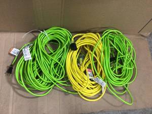 lot 32 image: Husky 50 ft. 162 Green Extension Cord Customer Returns See Pictures