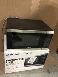 lot 90 image: Samsung 1.9 cu. ft. Countertop Microwave with Sensor Cook in Stainless Steel Customer Returns See Pictures