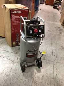 lot 115 image: 20 Gal. Vertical Electric-Powered Silent Air Compressor by Husky Customer Returns See Pictures