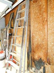 lot 34 image: Wooden Ladder--Folds Up For Storage