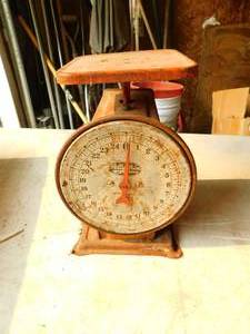 lot 54 image: Vintage Polly Prim Simmons Hardware Co. Scale