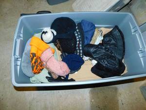 lot 68 image: Tub Full Of Winter Hats, Gloves. Mittens, Ear Muffs & Cover-Up Blankets