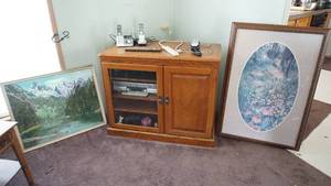 lot 113 image: Framed & Matted Picture-Framed Picture-Phones-Surge Protector-DVDS & VCR Tapes-Swivel For TV-Figurines-Entertainment Center Cabinet