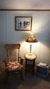 lot 118 image: Antique Wooden Rocking Chair W Floral Cushion On Seat-Round Table W Four Legs & A Shelf On Bottom & Ceramic Insert On Top-Lamp W Floral Shade
