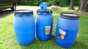 lot 71 image: Three Blue Barrels W Covers