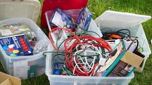lot 74 image: Christmas Tree Lights-Icicle Style Lights-Extension Cords-All In One Light Clips For Installation Of Lights On House Roof-All Items In Storage Tubs