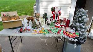 lot 76 image: A Table Full Of Christmas Items
