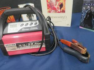 MISC LOT OF WESTERN MOVIES  MORE AND BATTERY CHARGER