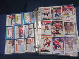 HUGE BLUE BINDER FULL OF COLLECTABLE HOCKEY CARDS (CANADA AND USA)
