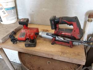 lot 229 image: Milwaukee 12V Cordless Grease Gun w (3) Batteries and Charger - Tested and Works