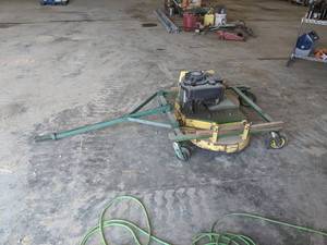 lot 71 image: Pull Behind Brush Mower w 10.5 HP Briggs and Stratton Engine