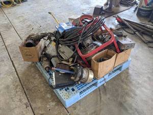 lot 105 image: PALLET LOT - Power Tools, Batteries, Vintage Car Radios, Air Brake Chambers, Truck Parts and More