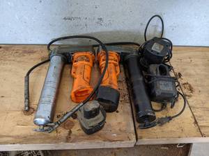 lot 147 image: Lot of (2) 12V Grease Guns w Charger