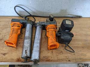 lot 148 image: Lot of (2) 12V Grease Guns w Charger