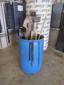 lot 180 image: Poly Barrel w Shovels, Scrapers and More