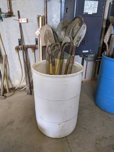 lot 182 image: Poly Barrel w (7) Spade Shovels