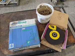 lot 218 image: 44 LB Roll ER70S-6 MIG Welding Wire (0.035), 9 Grinding Wheels and Log Chain