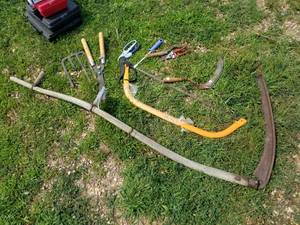 lot 657 image: Yard Tools  with Wood Handle Sickle, Tree Saw, Hedge Clippers, Snips