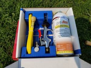 lot 672 image: Nu-Calgon Rx11 Refrigerant Flush Starter Kit (in original packaging)