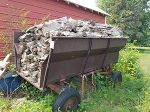 lot 614 image: BBB Manufacturing The Plato Line Grain Trailer  with Firewood