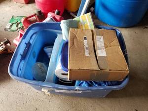 lot 729 image: Retirement Seminars on CDsDVDs, Flood Light Lamps, Storage Caddy, Tarp (in plastic storage bin)  with Plastic Bin