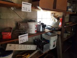 lot 713 image: Lot of Pittsburg 8 3-Jaw Puller, Battery Powered Light Fixture, Pressure Cooker, Concrete Mix (1 bag), Wood Blocks, and more (on 2nd from top shelf)
