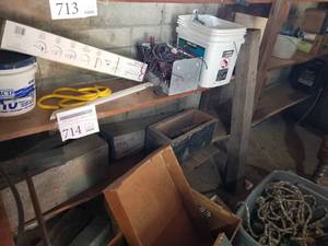 lot 714 image: Air Duct Sealant, Large Hooks (x3), Storage Rack Kit, Pipe Fittings, Wire, Johnstone Cast Iron L86-867Tournament Pitching Shoes Set, Mystik Hydraulic Oil (on bottom 2 shelves)