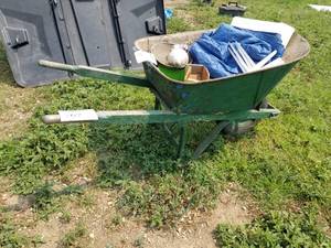 lot 767 image: Metal Wheelbarrow with Wood Handles and Rubber Wheel