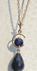 Faceted Bead Dangling Pending on Gold Chain