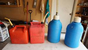Two Gas Cans--Two Blue Containers