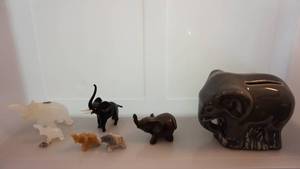 Seven Various Sizes Of Elephants