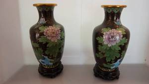 Two Hand Painted Brass Vases On Top Of Stand